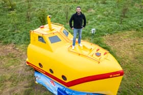 A lifeboat found floating in the sea has been turned into a real-life Yellow Submarine for glamping. 