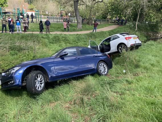 Officers in an unmarked blue BMW pursued the suspected stolen white Audi for 10 minutes (Photo: SWNS)