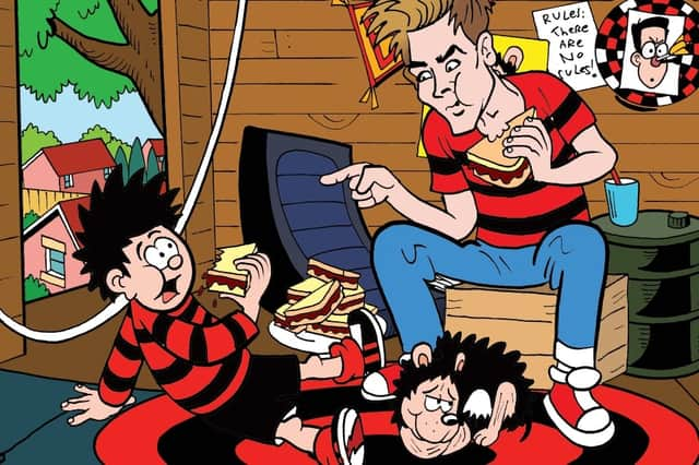 Joe Sugg with Dennis the Menace as the YouTuber and former Strictly Come Dancing star guest-edits a special Beano comic to celebrate 70 years of one of its best-loved characters (Image: Beano Studios)