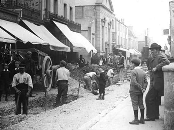 We cant be certain but it is believed that this photograph shows men working on the laying of gas mains in a Sussex street circa 1900.