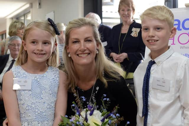 Her Royal Highness with Edward (nine) and Bella Page (six). Picture Kate Shemilt ks180220-10