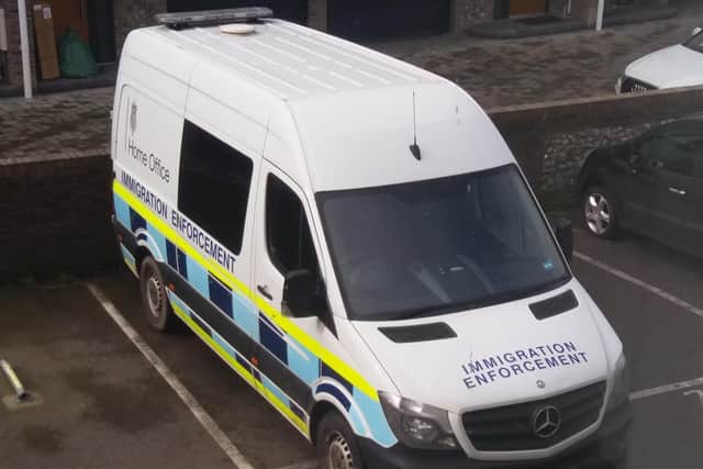 Immigration enforcement vans behind Shoreham High Street