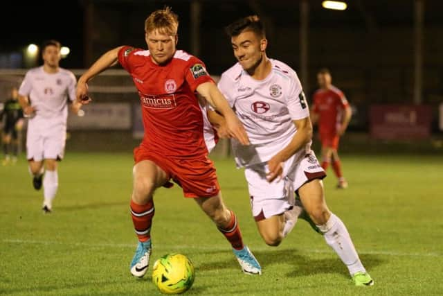 Davide Rodari closes down a Chipstead opponent. Picture courtesy Scott White