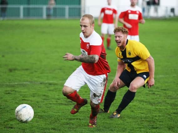 Rory Biggs received a straight red card as Arundel played out the final 30 minutes of their home clash against Newhaven on Saturday with ten men. Picture by Derek Martin