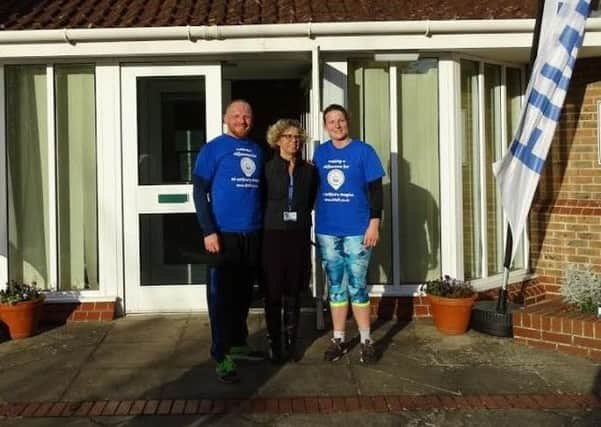 James and Georgina with Alison Moorey, chief executive of St Wilfrids