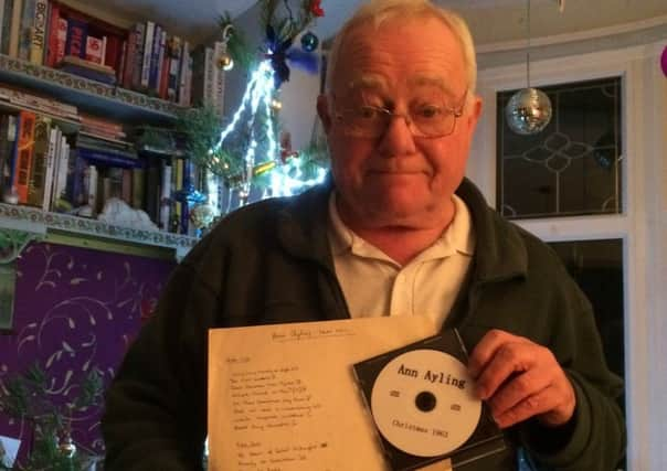 Robin Ayling with a copy of the Villa Maria carol service recording