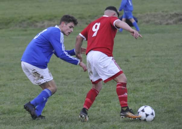 Action from the Premier Division clash between Bexhill Town and St Leonards Social. Pictures by Simon Newstead