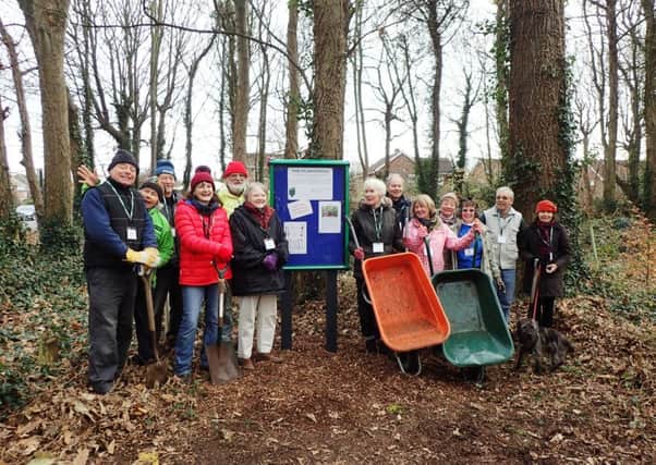Goring and Ilex Conservation Group with the new noticeboard in Amberley Drive
