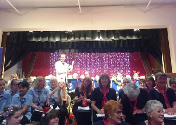 Compere Graham Tyler with Sussex West County Guide Choir and the Friendship Singers