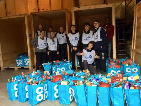 ABC Fund volunteers finish the hamper packing at Bee Moved in Newhaven.