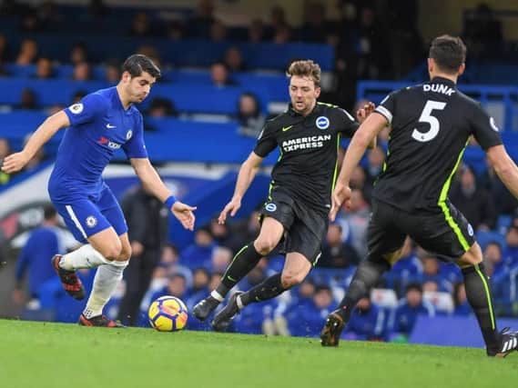 Dale Stephens closes down Alvaro Morata during Brighton's 2-0 defeat at Chelsea. Picture by Phil Westlake (PW Sporting Photography)