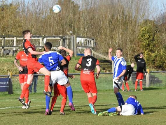 Action from Hassocks v Haywards Heath Town. Picture by Grahame Lehkyj