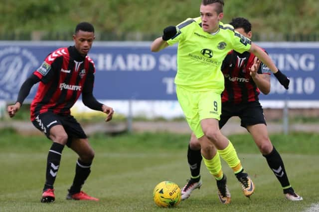 Calum Davies on the ball against Lewes. Picture courtesy Scott White