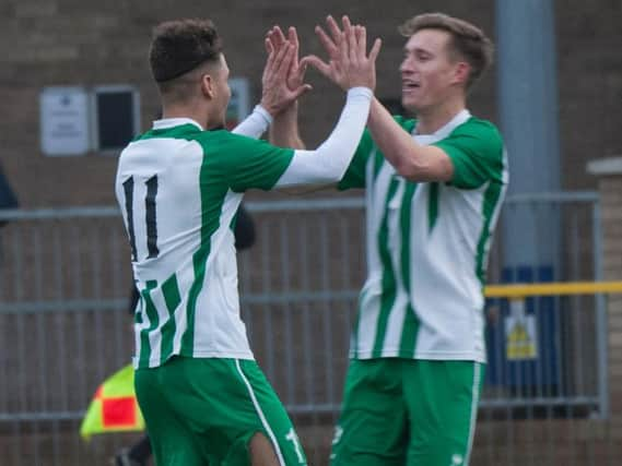 Chi City celebrate a goal at Lancing / Picture by Tommy McMillan