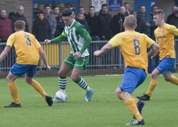 Chichester City on the attack at Lancing / Picture by Tommy McMillan