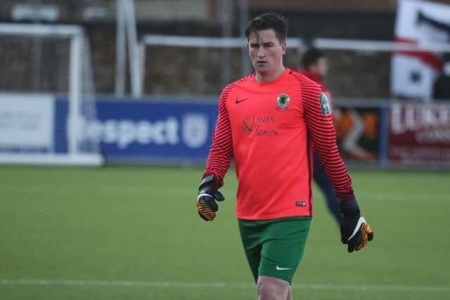 Horsham's Charlie Harris takes over in goal for the injured Brannon Daly against Lewes. Picture by John Lines.