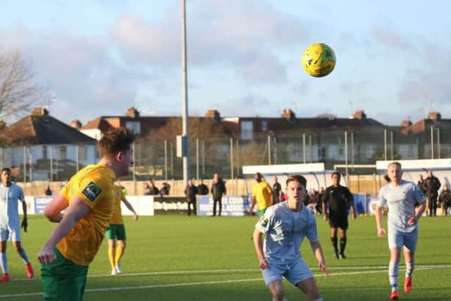 Charlie Harris heads Horsham ahead against Lewes on New Year's Day. Picture by John Lines