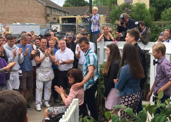 The Worne family thanking traders on the big reveal