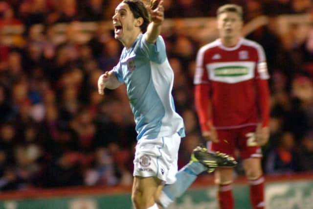 Bradley Goldberg celebrates in front of the Hastings United supporters after scoring his wonder goal.