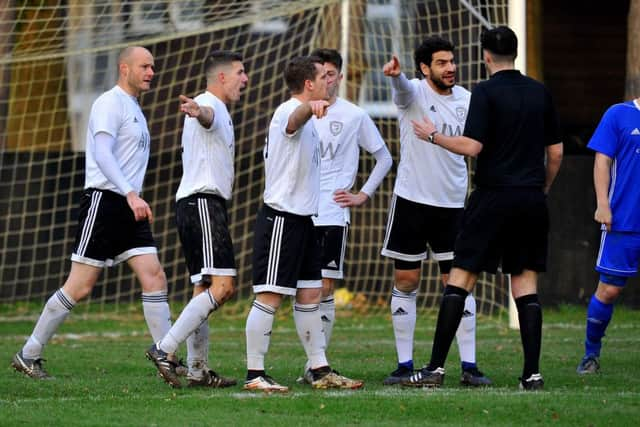 Football, SCFL Premier Division: Loxwood v Broadbridge Heath. Loxwood contest the penalty decsion after 3 mins. Pic Steve Robards SR18001399 SUS-180801-062110001