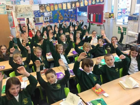 Chantry Community Primary School pupils celebrate the news.