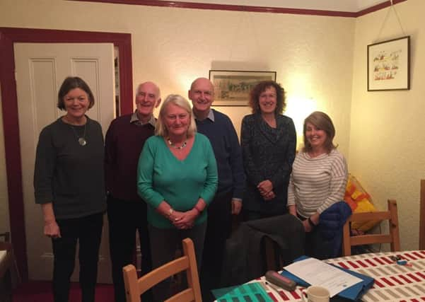 Chairman of the charity councillor Richard Cherry with volunteers