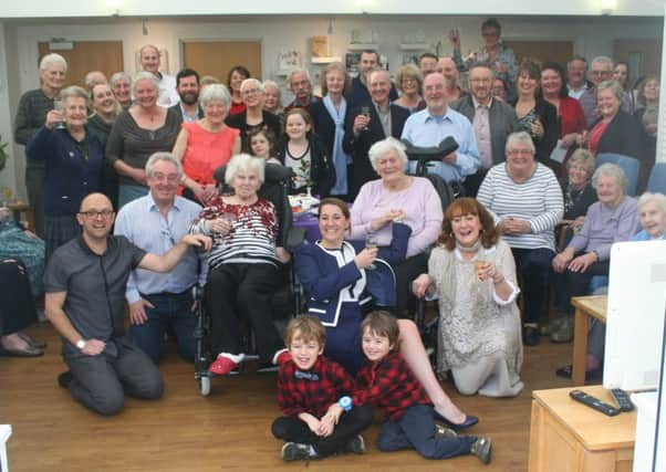 Zoe Bates, the owner and manager at Valerie Manor nursing home, in Upper Beeding with staff and residents