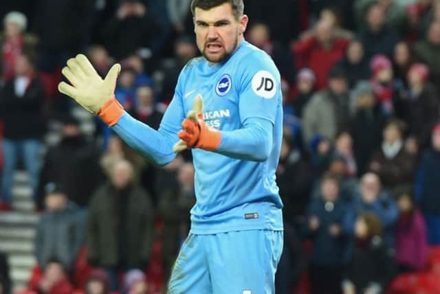 Mathew Ryan celebrates his late penalty save. Picture by Phil Westlake (PW Sporting Photography)