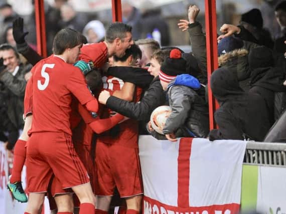 Worthing celebrate a goal in the win over Fokkestone on Saturday. Picture by Stephen Goodger