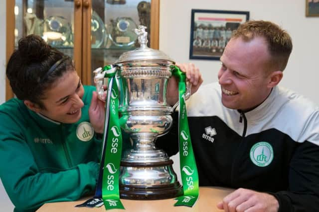 Emma Alexandre and Matt Wright admire a nice bit of silverware