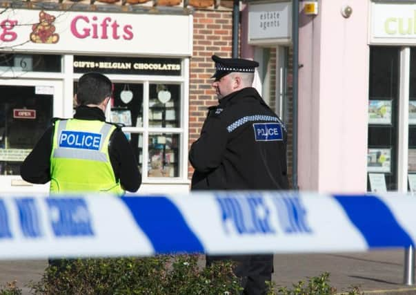 Police cordoned off Lintot Square in Southwater