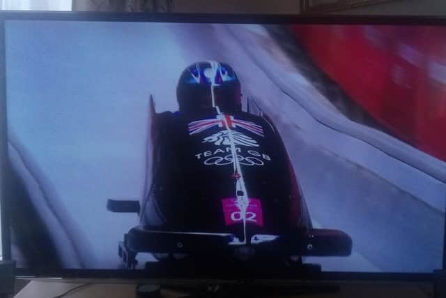 Team GB bobsleigh star Brad Hall in action in Heat 2.
Picture by Graham Carter SUS-180218-161708002