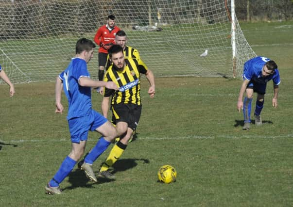 Action from the Wisdens Sports Challenge Cup quarter-final between Bexhill Rovers and Catsfield. Pictures by Simon Newstead