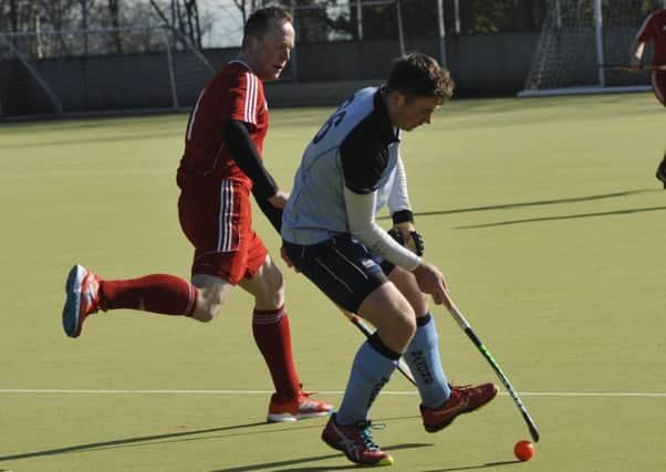 Nick Taylor on the ball for South Saxons against Southwick. Pictures by Simon Newstead