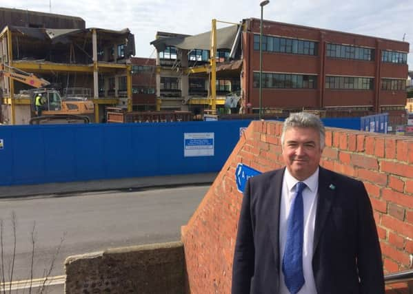 Neil Parkin at the site as demolition gets underway SUS-170404-121015001