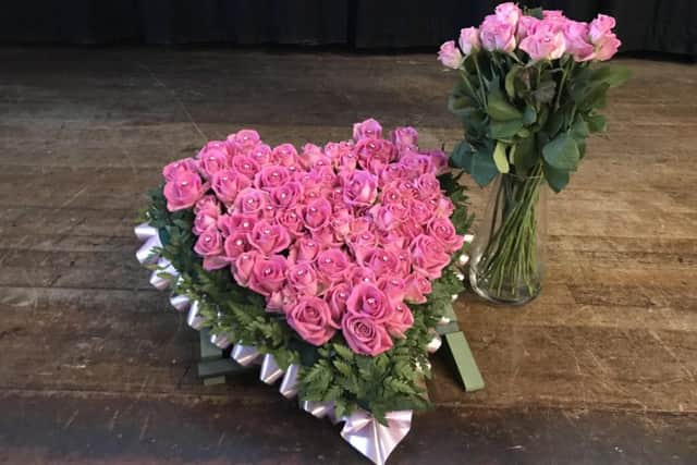 The wreath of pink roses as part of the service for Megan Spence, who was originally from Belfast