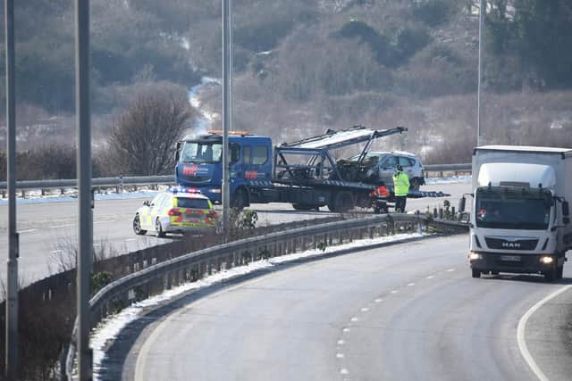 Police sealed off the road as the vehicle was recovered (Photograph: Eddie Mitchell)