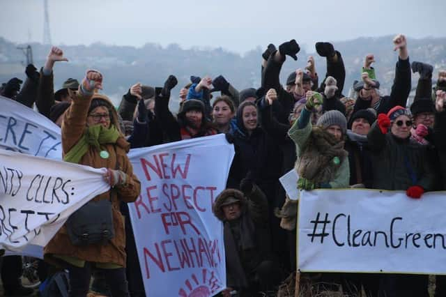 Getting the message across ... protesters on the beach