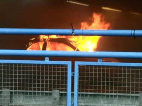 Burning car in Orchard Street car park