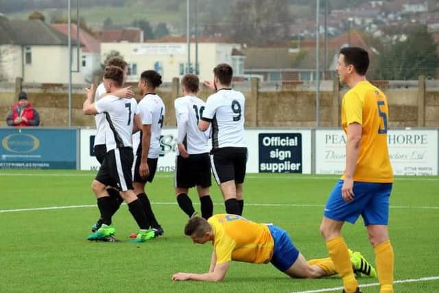 Pagham celebrate Lloyd Rowlatt's goal / Picture by Roger Smith