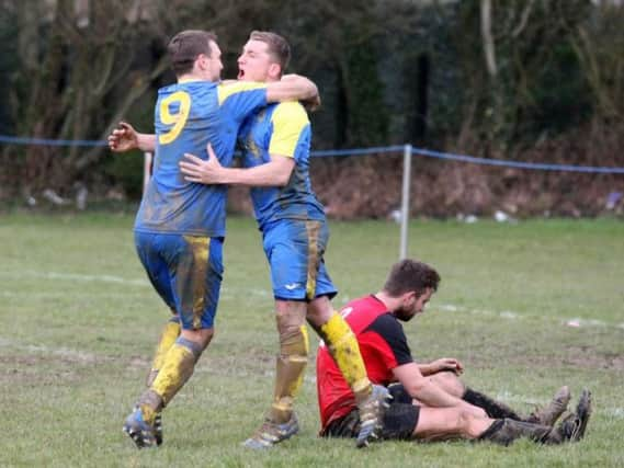 Declan Jenkins celebrates after netting one of his two goals in Rustington's Sussex Intermediate Cup semi-final win. Picture by Derek Martin DM1831805