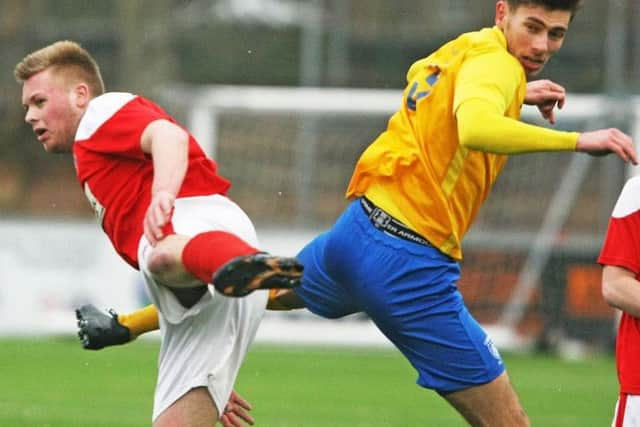 Liam Benson netted a penalty as Lancing scored a first win in 2018 on Saturday. Picture by Derek Martin