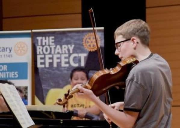 Archie Freeman playing the violin