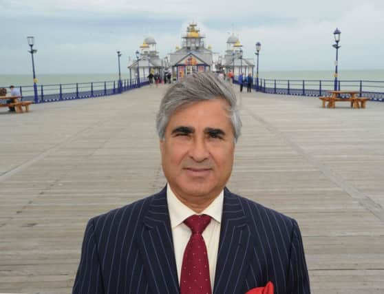 Mr Gulzar on Eastbourne Pier (Photo by Jon Rigby) SUS-160408-083601008