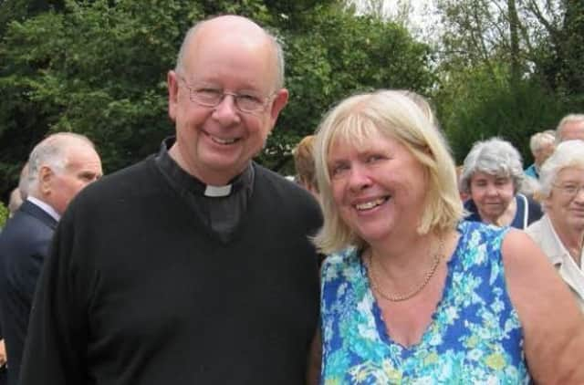 Canon Will Pratt and his wife Linda at his retirement party