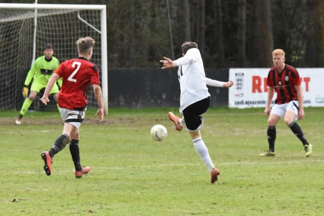 Action from Loxwood's defeat to Haywards Heath Town on Saturday. Picture by Grahame Lehkyj