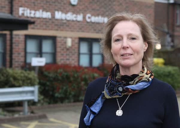 Partner Yvonne Grant outside the Fitzalan Medical Centre in Littlehampton. Picture: Derek Martin Photography