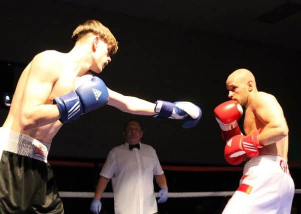Action from the ring of Love to Box round two