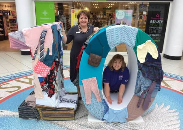 Victoria Godfrey from Cancer Research UKs East Street store with Gill Buchanan, Swan Walk centre manager