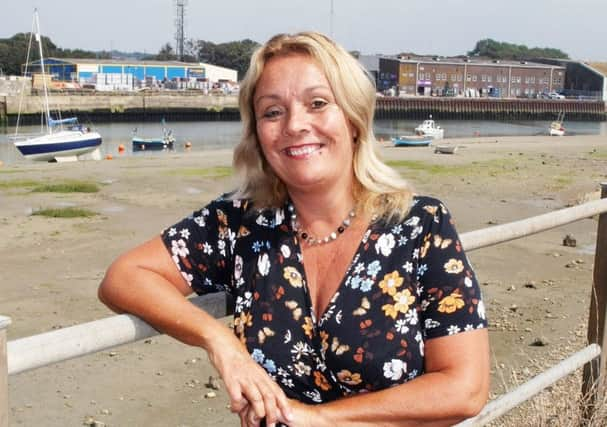 DM17842432a.jpg Plans unveiled for Â£50m development of Kingston Wharf, Shoreham-by-Sea. Cllr Joss Loader with the site in the background. Photo by Derek Martin SUS-170829-162425008